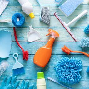 House cleaning product on wood table, top view